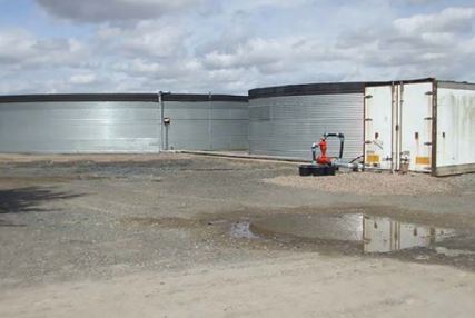Water storage tanks on a farm site